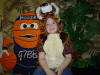 child photo with mascot at charity carnival fundraiser