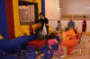 We provide supervisors for every entrance and exit, colorful chairs for sorting the children by size, parents can help children with their shoes. Organized, impresive, supervised and safe presentation.