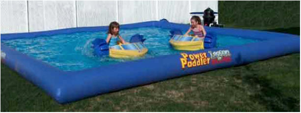 backyard water park with paddle boats for children's party